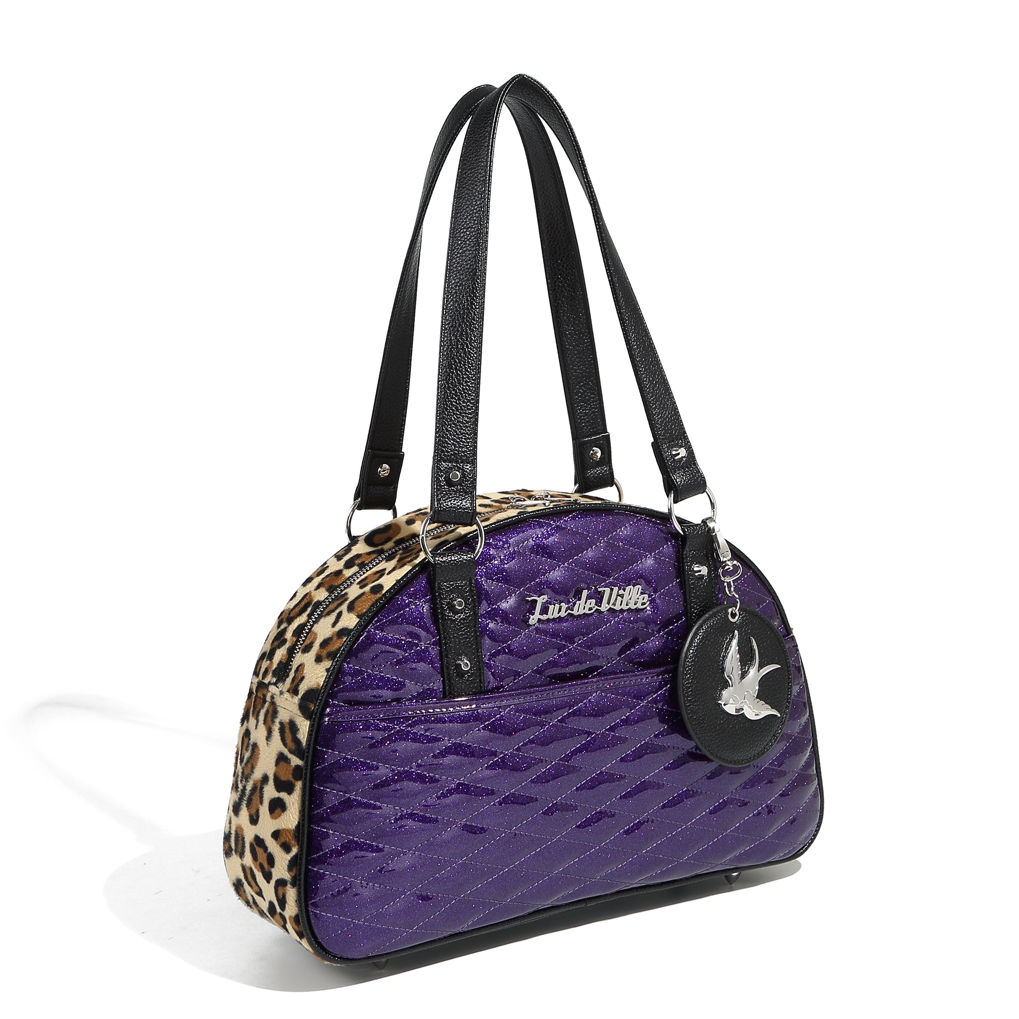 Retro Lux De Ville High Seas Kiss Lock large travel bag, leopard newest lining, shoulder length straps, bullet feet, and all of your necessities.